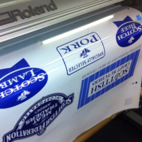 vinyl being printed by Glasgow Banners